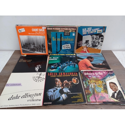 713 - A collection of jazz LP vinyl records to include Duke Ellington, Fats Waller, Sarah Vaughan, Bud Pow... 