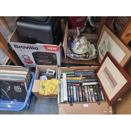 901 - A large quantity of house clearance items to include books, vinyl records, oak framed bevelled edge ... 