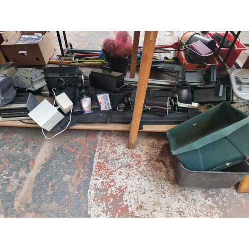 901 - A large quantity of house clearance items to include books, vinyl records, oak framed bevelled edge ... 