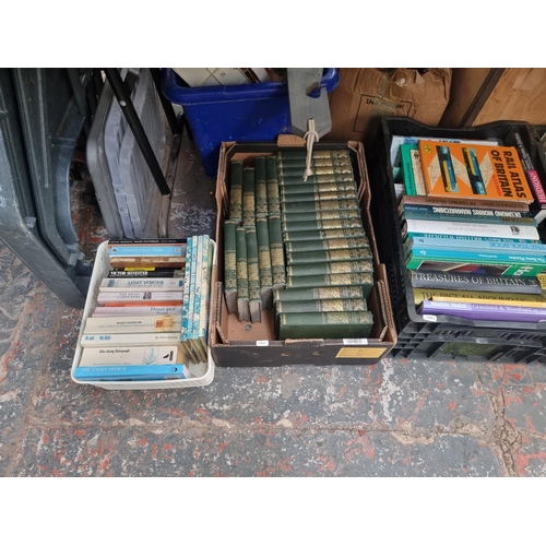 911 - Seventeen boxes containing a large quantity of books, magazines and ordnance survey maps