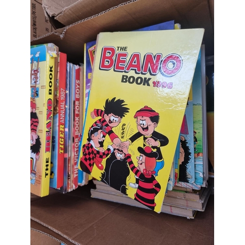 925 - A box containing a large quantity of vintage annuals to include Beano, The Dandy, Tiger etc.