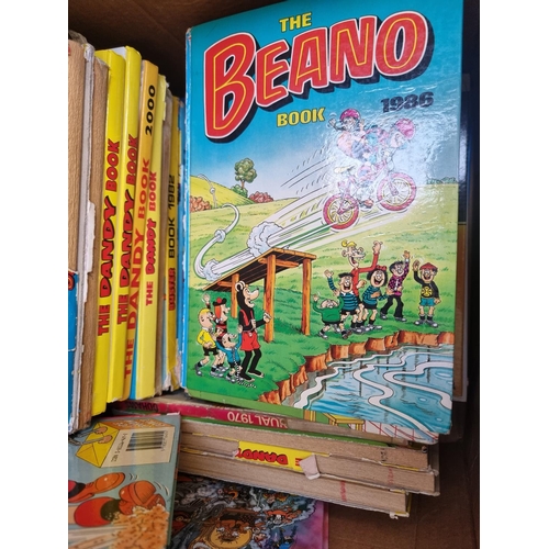 925 - A box containing a large quantity of vintage annuals to include Beano, The Dandy, Tiger etc.