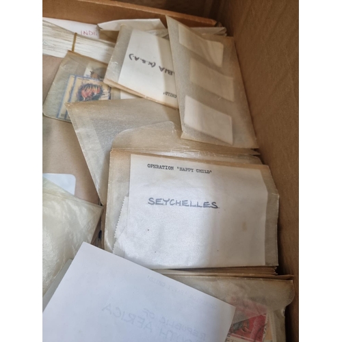 929 - A box containing a large quantity of worldwide stamps