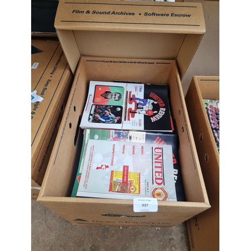 937 - A box containing a large quantity of United Review football programs