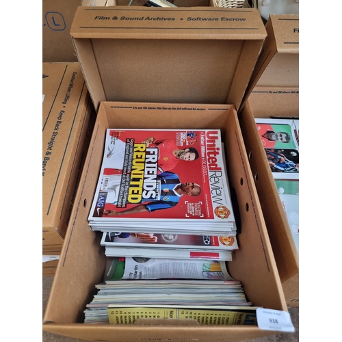 938 - A box containing a large quantity of United Review football programs