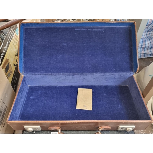 941 - Three travel cases to include mid 20th century brown leather etc.