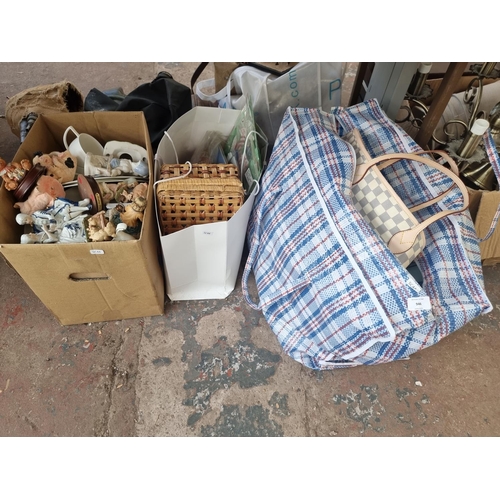 946 - Two bags and one box containing women's handbags, figurines, wicker basket etc.