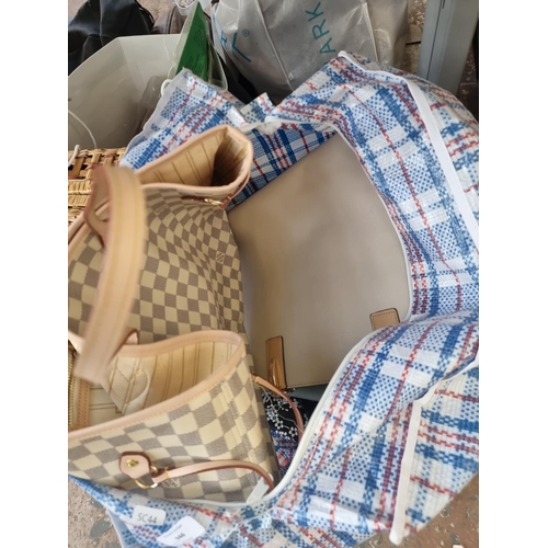 946 - Two bags and one box containing women's handbags, figurines, wicker basket etc.