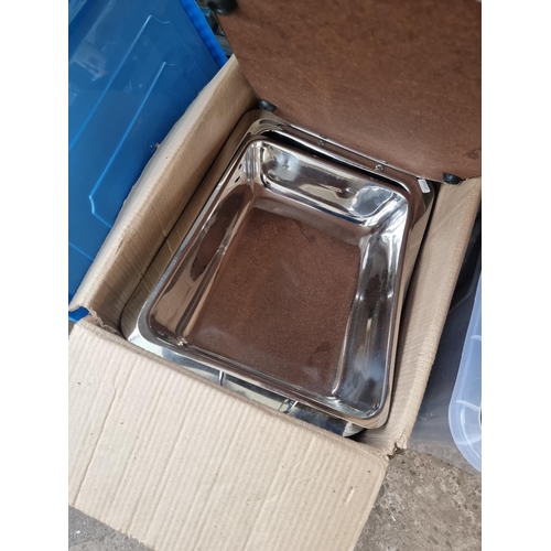 961 - Two boxes containing pictures and stainless steel trays