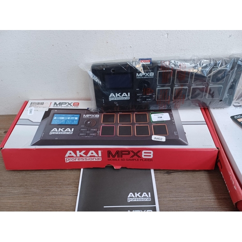 738 - Three boxed Akai items, one MPX8 mobile SD sample player, one APC Mini compact Ableton live controll... 