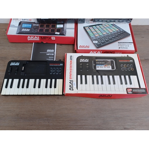 738 - Three boxed Akai items, one MPX8 mobile SD sample player, one APC Mini compact Ableton live controll... 