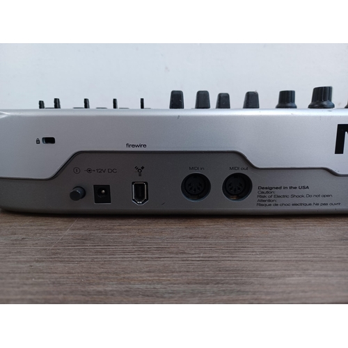 740 - An M-Audio Ozonic midi controller/FireWire audio interface