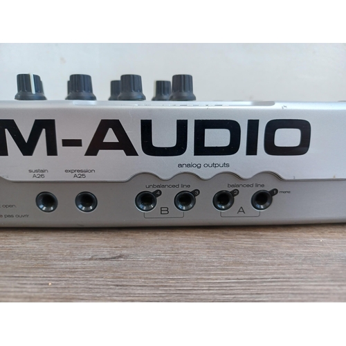 740 - An M-Audio Ozonic midi controller/FireWire audio interface