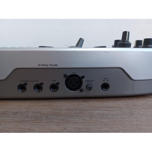 740 - An M-Audio Ozonic midi controller/FireWire audio interface