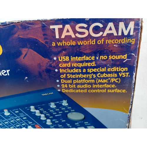 741 - Two Tascam US-428 universal serial bus digital audio workstation controllers, one boxed with instruc... 