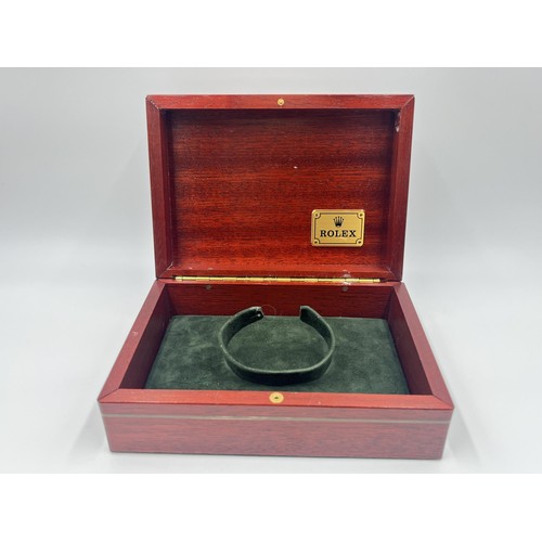 1243 - A Rolex mahogany wristwatch presentation box with leather guarantee card holders for 1990s Daytona m... 