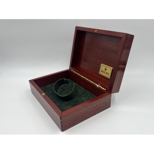 1243 - A Rolex mahogany wristwatch presentation box with leather guarantee card holders for 1990s Daytona m... 