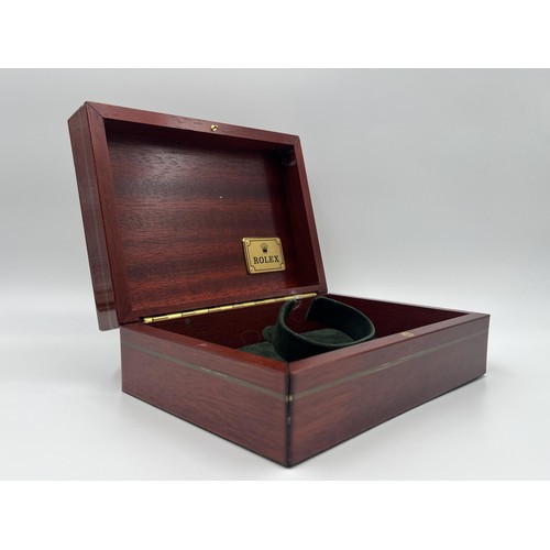 1243 - A Rolex mahogany wristwatch presentation box with leather guarantee card holders for 1990s Daytona m... 