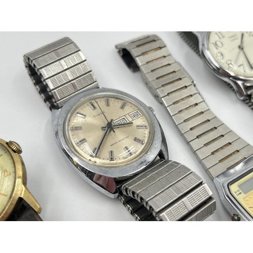 1266 - Four vintage Timex mechanical and quartz men's wristwatches