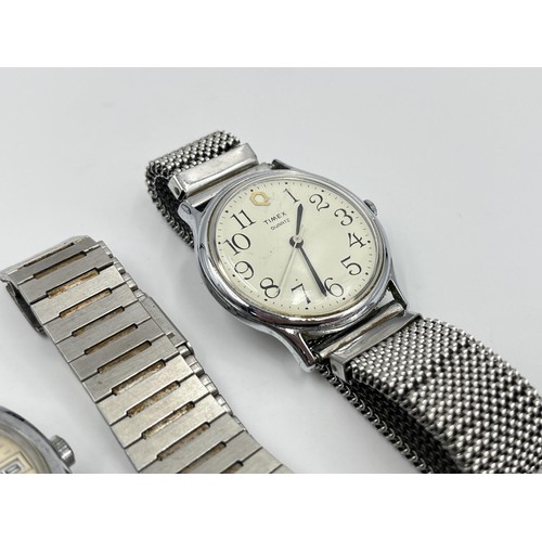 1266 - Four vintage Timex mechanical and quartz men's wristwatches