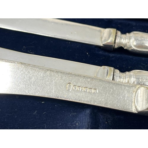 1335 - A cased set of six Harrison Fisher & Co hallmarked Sheffield silver handled knives, dated 1921