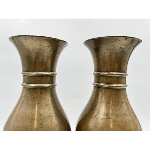 1340 - A pair of late 19th/early 20th century ecclesiastical copper church flower vases in the manner of Jo... 