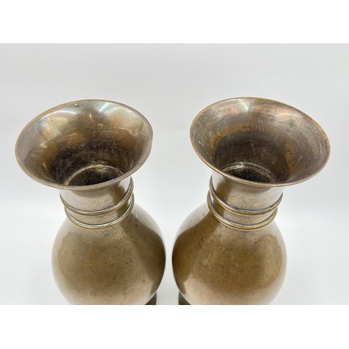 1340 - A pair of late 19th/early 20th century ecclesiastical copper church flower vases in the manner of Jo... 