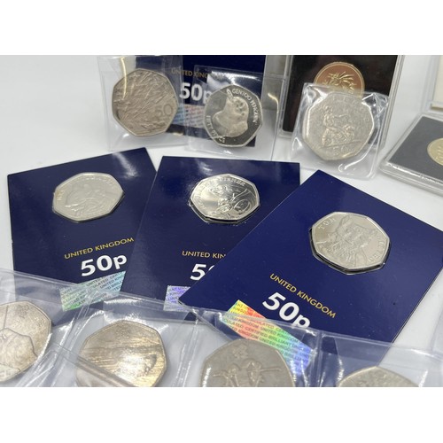 1345 - A collection of sealed Great British collectable coins to include The Royal Mint Beatrix Potter 50p ... 