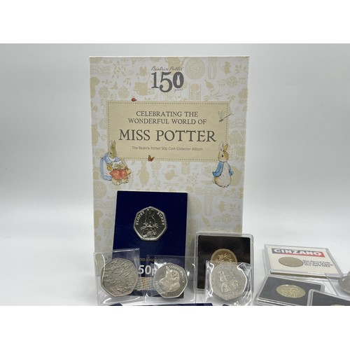 1345 - A collection of sealed Great British collectable coins to include The Royal Mint Beatrix Potter 50p ... 