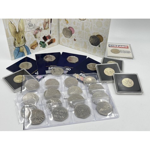 1345 - A collection of sealed Great British collectable coins to include The Royal Mint Beatrix Potter 50p ... 