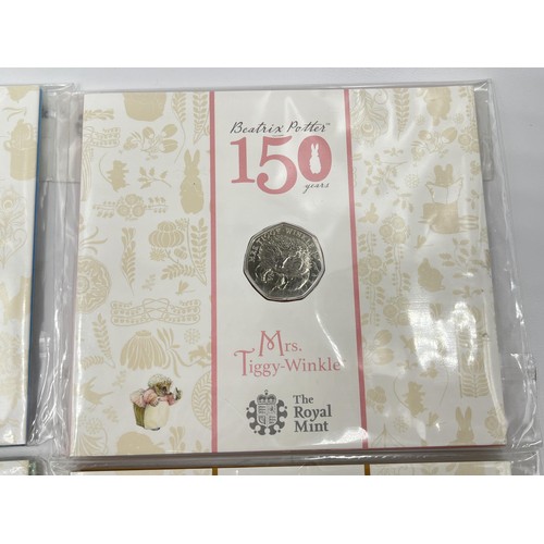 1346 - A collection of sealed Great British The Royal Mint and British Pobjoy Mint collectible coins to inc... 