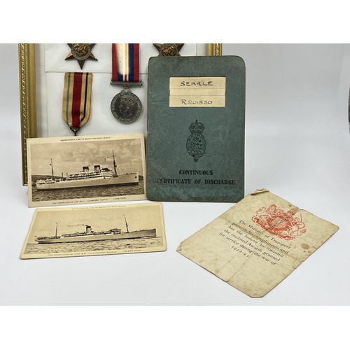 1347 - Five framed WWII British medals, one The Africa Star, one The Atlantic Star, one The Pacific Star, o... 