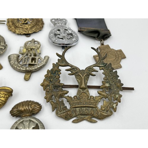 1356 - A collection of militaria and medals to include WWI 1914-1919 Victory medal presented to 200419 PTE.... 