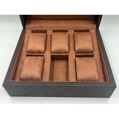 1253A - A Constantin Weisz leatherette six section watch storage box