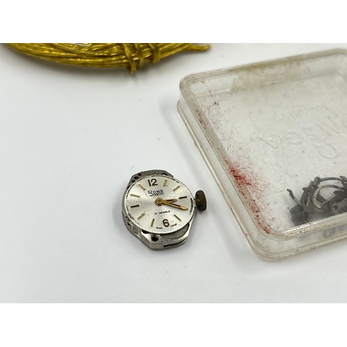 1253B - A large collection of watch parts and watchmakers accessories to include dials, movements, tools, Ro... 