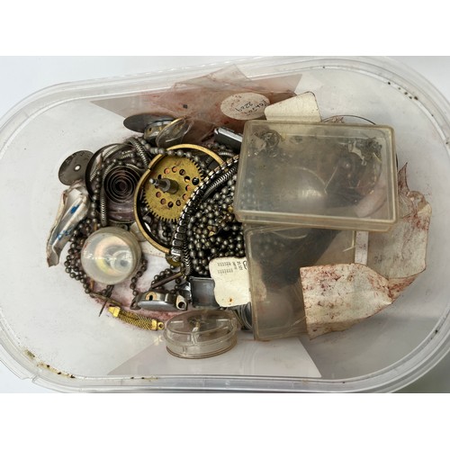 1253B - A large collection of watch parts and watchmakers accessories to include dials, movements, tools, Ro... 