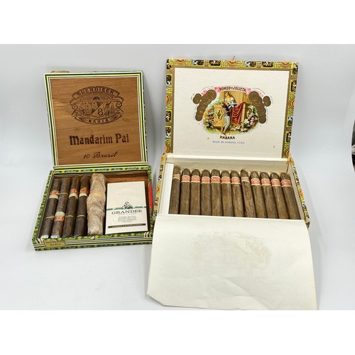 1380 - Two cigar boxes containing twenty two cigars