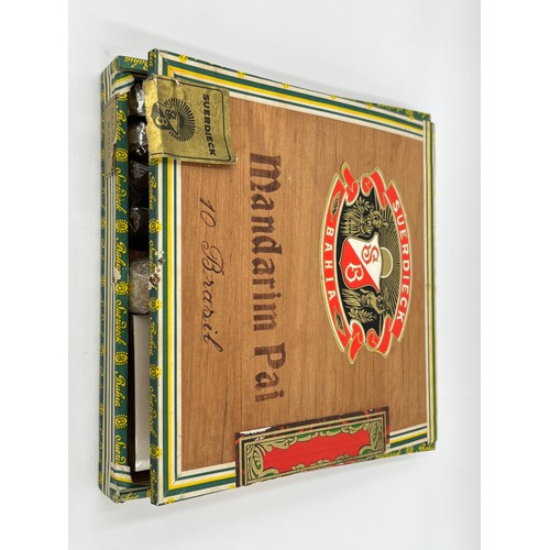 1380 - Two cigar boxes containing twenty two cigars