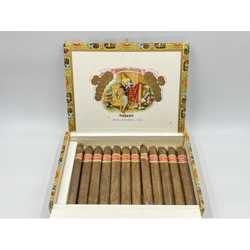 1380 - Two cigar boxes containing twenty two cigars