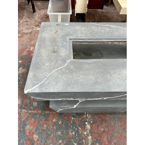 109 - A modern cast stone rectangular outdoor firepit table - approx. 43cm high x 80cm wide x 158cm long