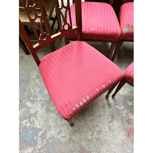 11 - A set of four mahogany and red fabric upholstered dining chairs