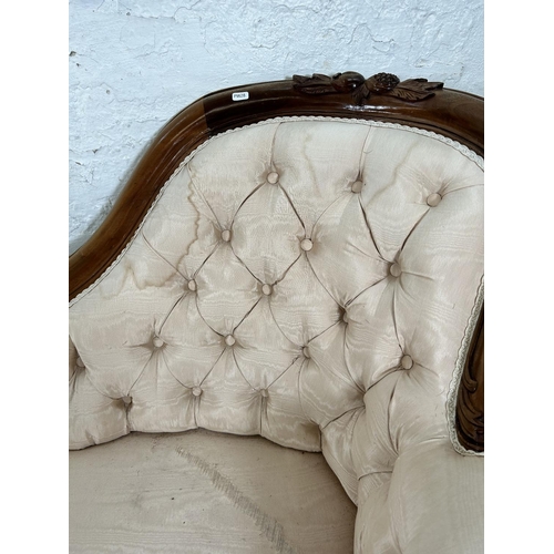 130 - A Victorian style walnut framed and fabric upholstered parlour sofa - approx. 85cm high x 203cm wide... 