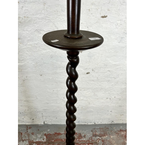 132 - A 19th century style beech barley twist standard lamp - approx. 166cm high