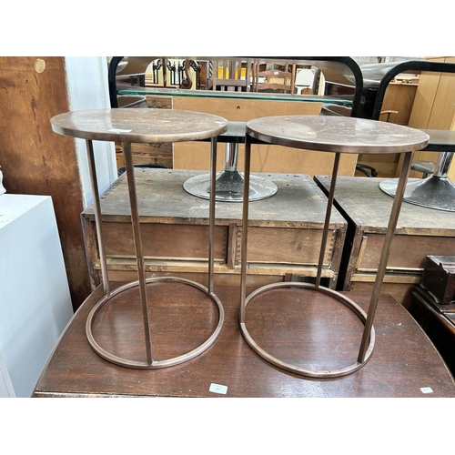 179 - A pair of modern brushed copper effect circular side tables
