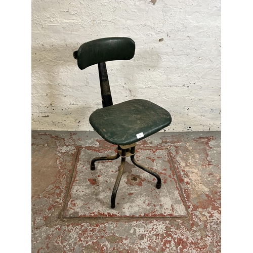 195 - A 1950s Leabank green vinyl and black metal swivel machinist’s chair