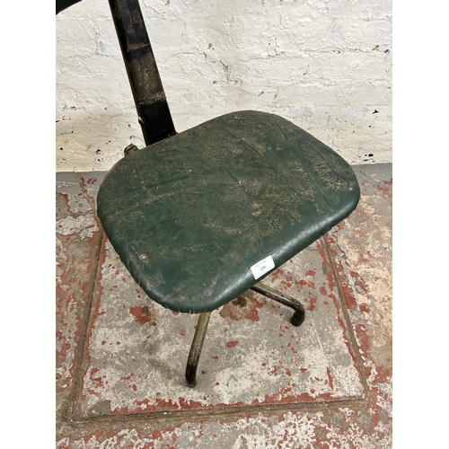 195 - A 1950s Leabank green vinyl and black metal swivel machinist’s chair