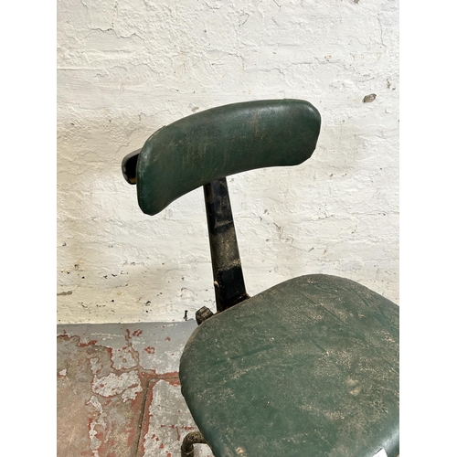 195 - A 1950s Leabank green vinyl and black metal swivel machinist’s chair
