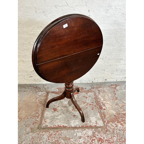 198 - A George III mahogany oval tilt top occasional table on tripod pedestal support