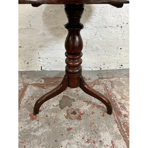 198 - A George III mahogany oval tilt top occasional table on tripod pedestal support
