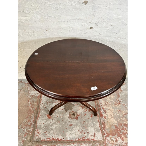 198 - A George III mahogany oval tilt top occasional table on tripod pedestal support